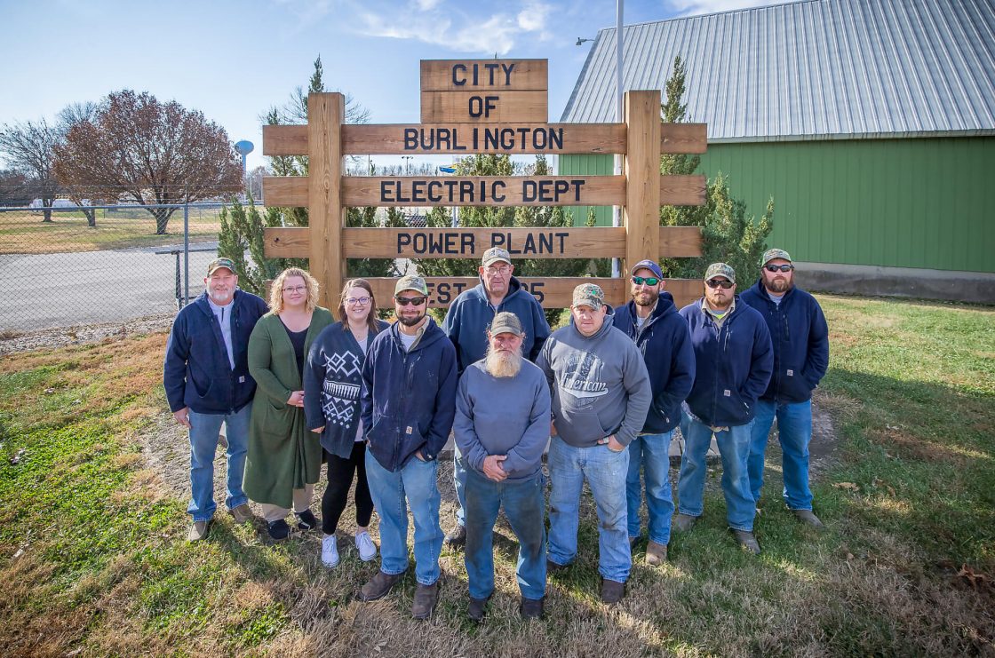 Burlington City Members Posing in Front of Burlington Electric Department