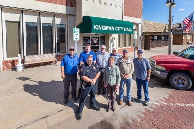 Kingman City Members Standing In Front of Kingman City Hall