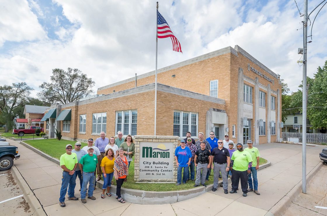 Marion City Members Standing In Front of Marion City Building & Community Center